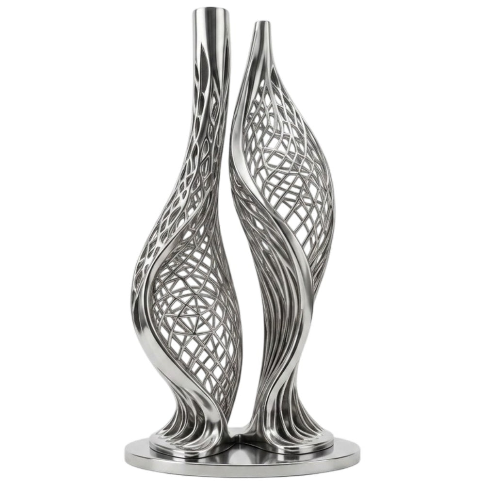 Silver decorative sculpture with intricate design on a white background