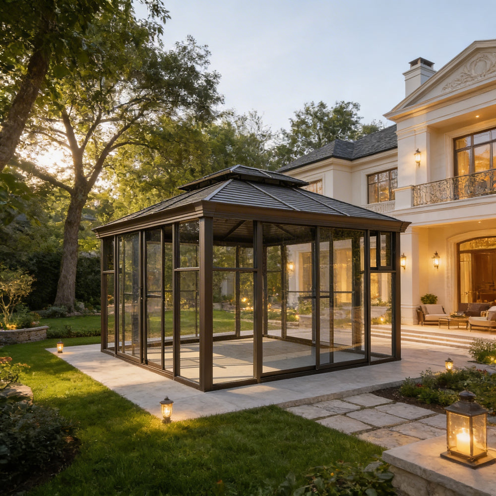 Glass gazebo in a backyard with a house in the background