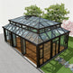 Glass greenhouse with a roof structure on a neutral background