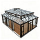 Modern double‑tier glass conservatory with raised roof vent
