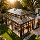Contemporary glass pavilion with dual‑level roof design