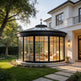 Luxury round sunroom with steel frame and glass walls