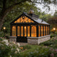 Orchard house with warm lighting surrounded by flowers and trees