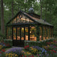 Glasshouse with ivy and flowers in a garden setting