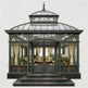Large glass conservatory with a domed roof and ornate detailing on a white background