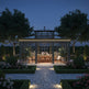 Luxury glass pavilion with symmetrical steel frame design