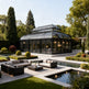 Victorian garden conservatory with curved roof and metal scrollwork