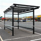 Structural beam and support detail of TAIMCO metal shopping cart shelter showcasing commercial‑grade fabrication.