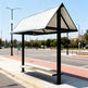 TAIMCO outdoor bench shelter installed in a public space with protective metal canopy.