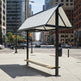 Close‑up of angled metal roof panels on TAIMCO bench shelter highlighting weather‑resistant construction.