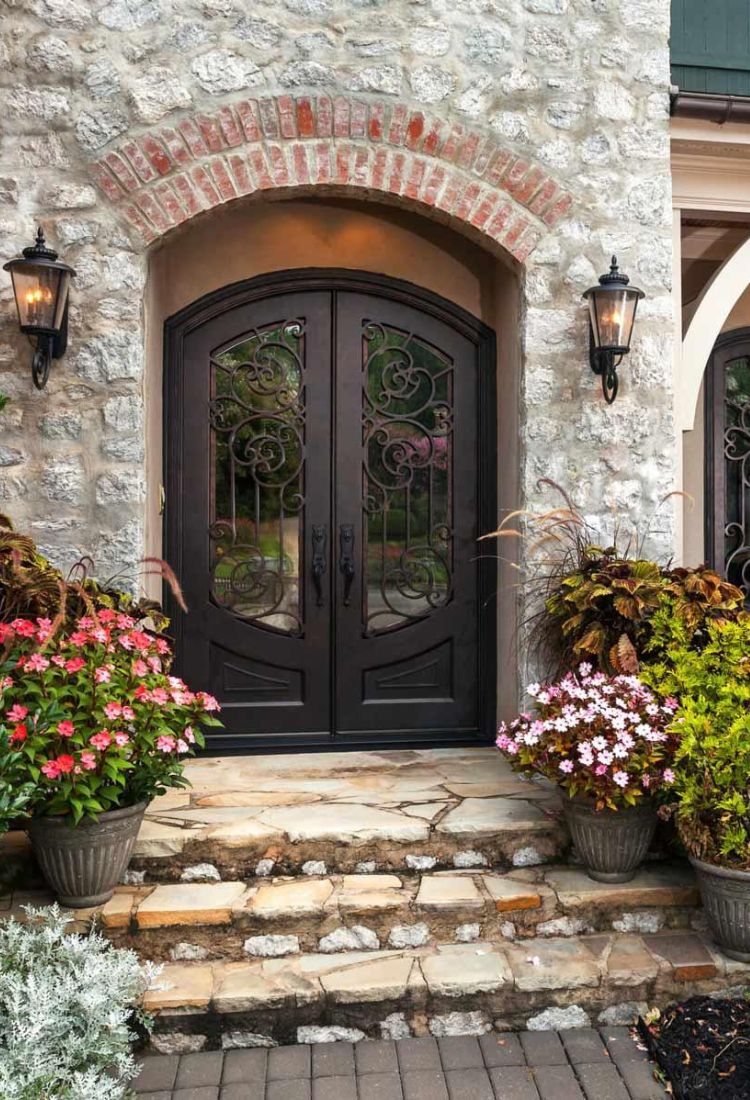 Elegant Black Iron door in front of vintage house in USA