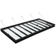 Metal bed frame with mattress on a white background