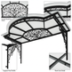 Decorative metal bench with intricate designs on a white background
