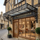 Traditional building exterior with 'The Artisan's Parlour' sign