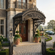 Ornamental wrought iron canopy designed for upscale entrances.