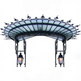 Arched glass canopy with ornate wrought iron scrollwork and dual lantern lights.