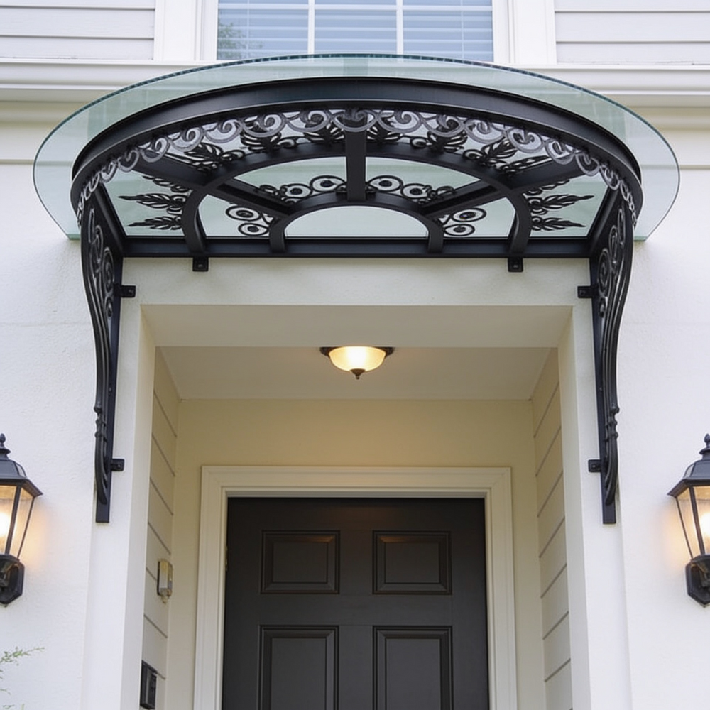 Decorative exterior canopy with curved glass and ornate iron frame.