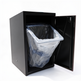 Black trash bin with a plastic bag inside on a white background