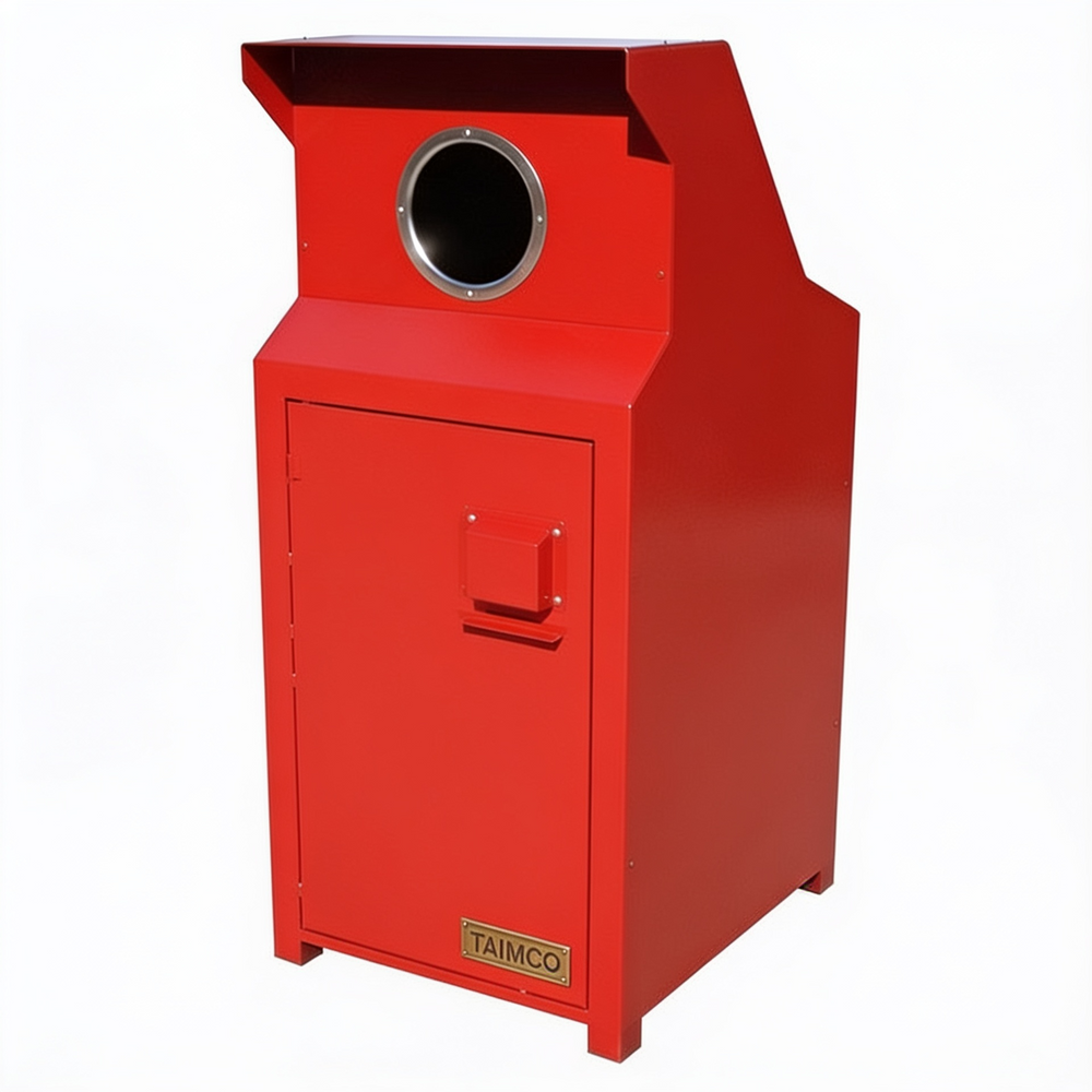 A red metal industrial waste container or bin with a circular opening on top, a front access door, and a small TAIMCO label near the bottom, shown on a plain white background.
