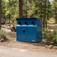 Durable yellow steel enclosure designed with upper ventilation ports and lower storage doors
