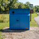 Metal processing cabinet with dual circular openings and double‑door access