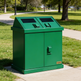 Commercial park waste bin with twin compartments and angled top hoods

