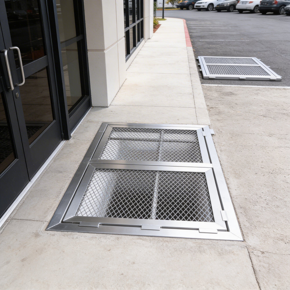Heavy‑duty aluminum window well grate with expanded‑metal mesh and reinforced frame, designed for basement safety and ventilation.