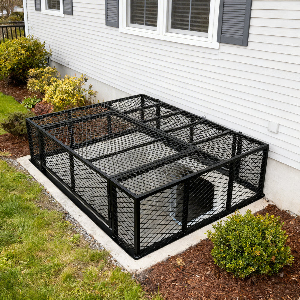 Powder‑coated steel window well grate with welded round‑bar grid and reinforced frame for basement safety and ventilation.