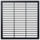 Black steel round‑bar window well grate installed beside a stone exterior wall with surrounding landscaping.