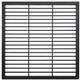 Black steel round‑bar window well grate installed beside a stone exterior wall with surrounding landscaping.