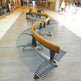 Curved Bench Formed From Rounded Steel Bars | Model COLL1693-Taimco