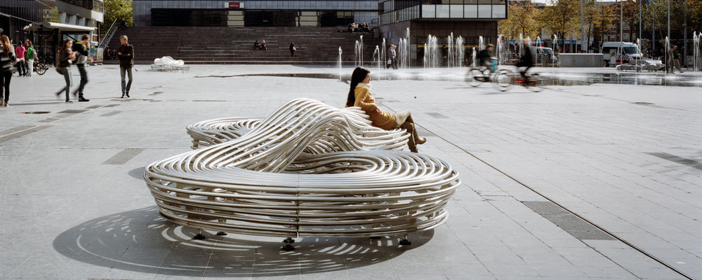 Waved Benchmark City Bench Formed From Rounded Stainless Steel Bars and Tubes | Model COLL1697